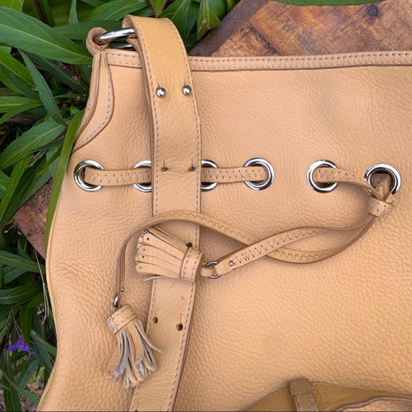 Cole Haan Handbags - 💛 Cole Haan crossbody bag, light tan with silver hardware & grommet detail.